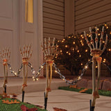 Celebrations Halloween Warm White 18 in. LED Prelit Chained Skeleton Arms Pathway Decor