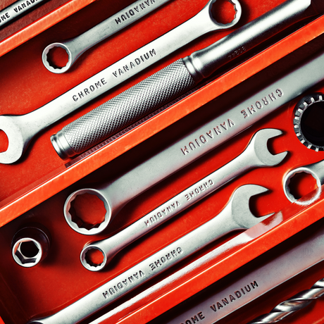 Chrome Vanadium wrenches displayed with other tools in a red case